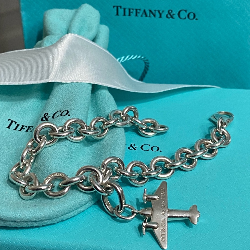 Tiffany bracelet with travel charm.